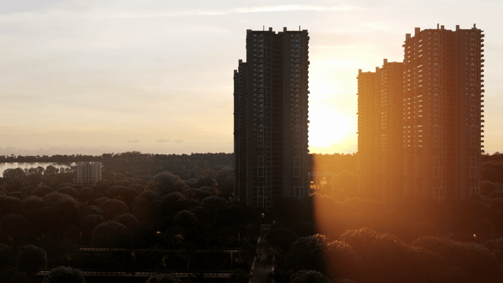 “Supadha Gamya high-rise buildings at sunset”